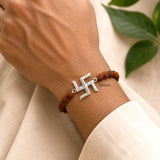 Natural Rudraksha bracelet featuring a 925 sterling silver Swastika symbol.