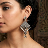 Bold tribal sterling silver earrings with geometric patang design
