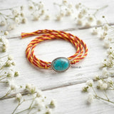 Silver Rakhi with Oval Reconstituted Turquoise Stone for Brother