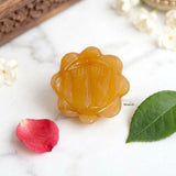 Close-up of yellow Charan Paduka showing its gemstone colour and details