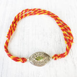 PERIDOT SILVER RAKHI - SILBERUH