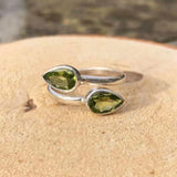 green gemstone silver ring peridot design